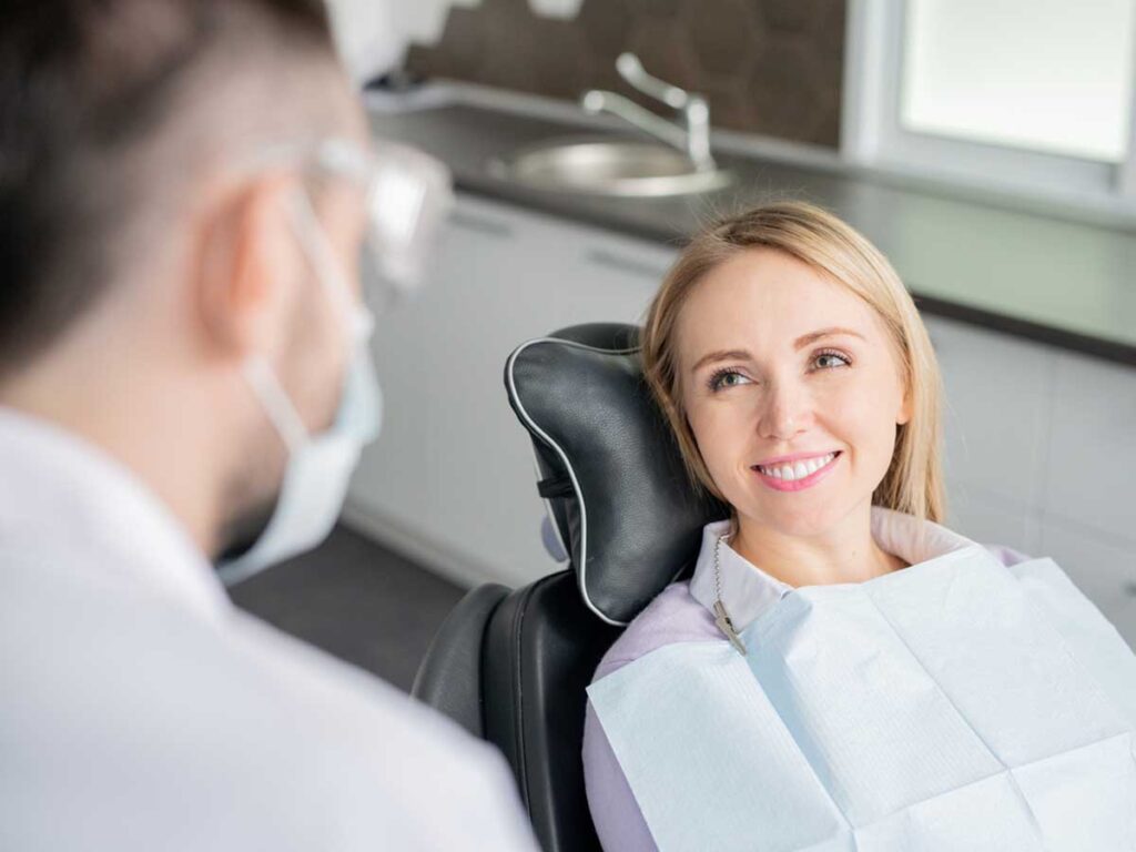 Happy young female patient